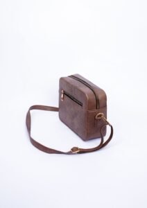 Best Crossbody Bags for Women brown leather crossbody bag on a white background