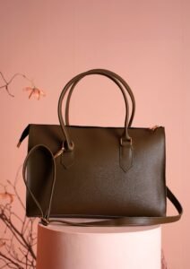 Best Leather Handbags brown leather handbag on a neutral background
