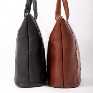 Leather vs. Vegan Leather black and brown handbags displayed side by side